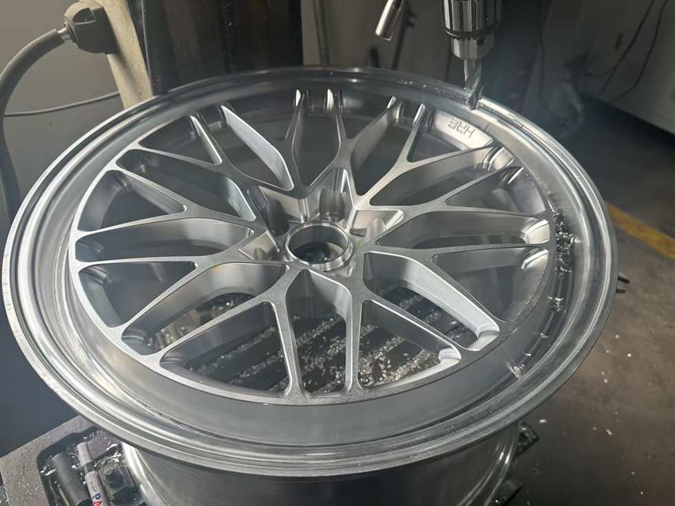 Alloy wheel polishing station before painting and clear coat