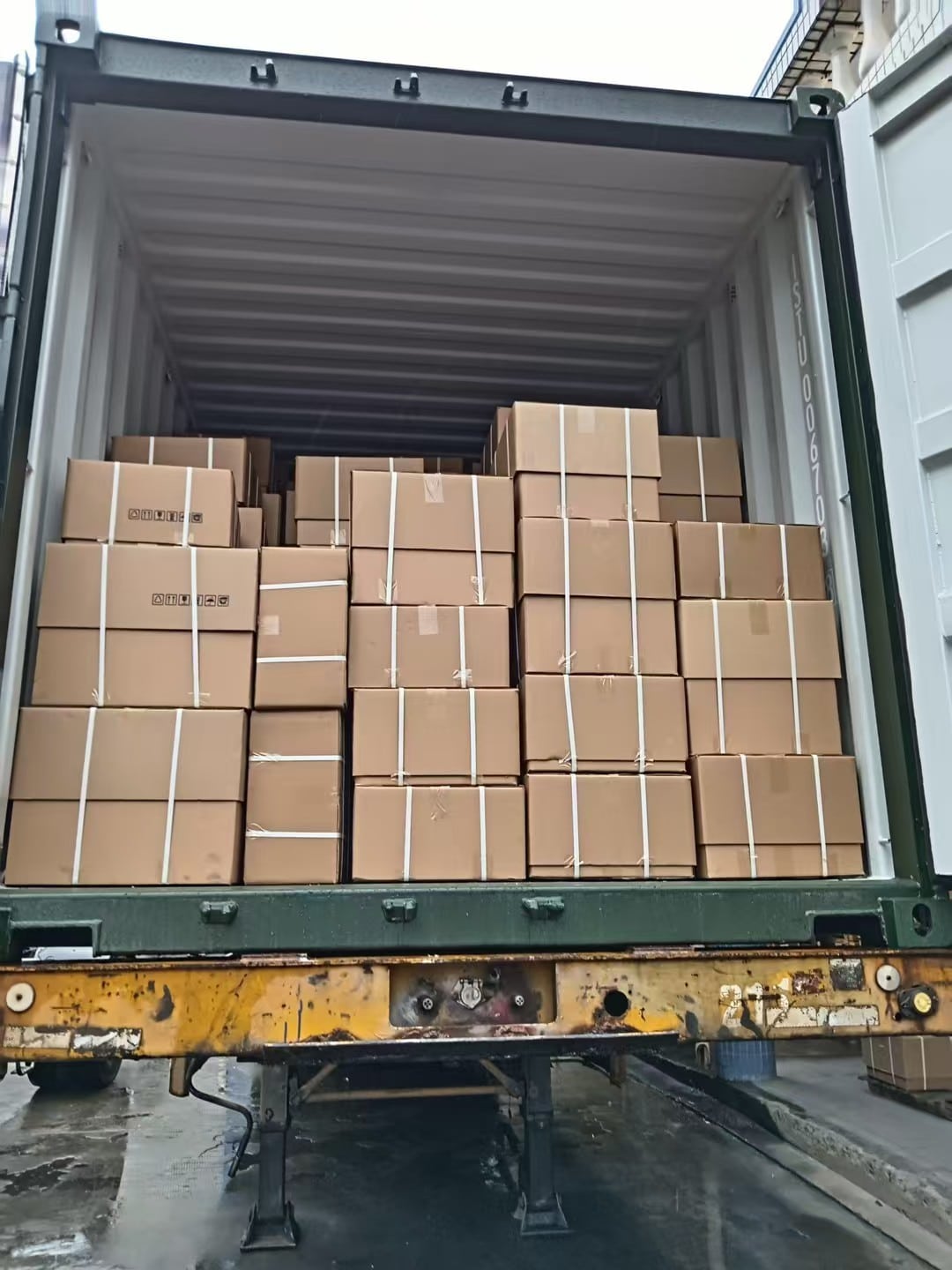 Alloy wheel cartons loaded into export container