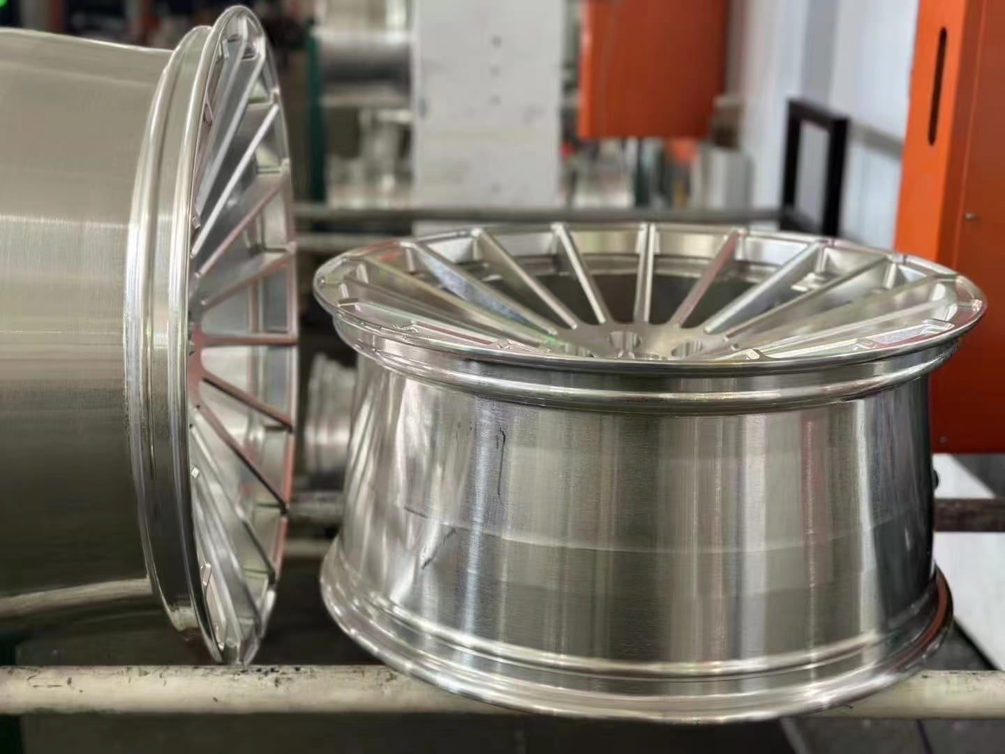 Finished alloy wheel close-up in a workshop