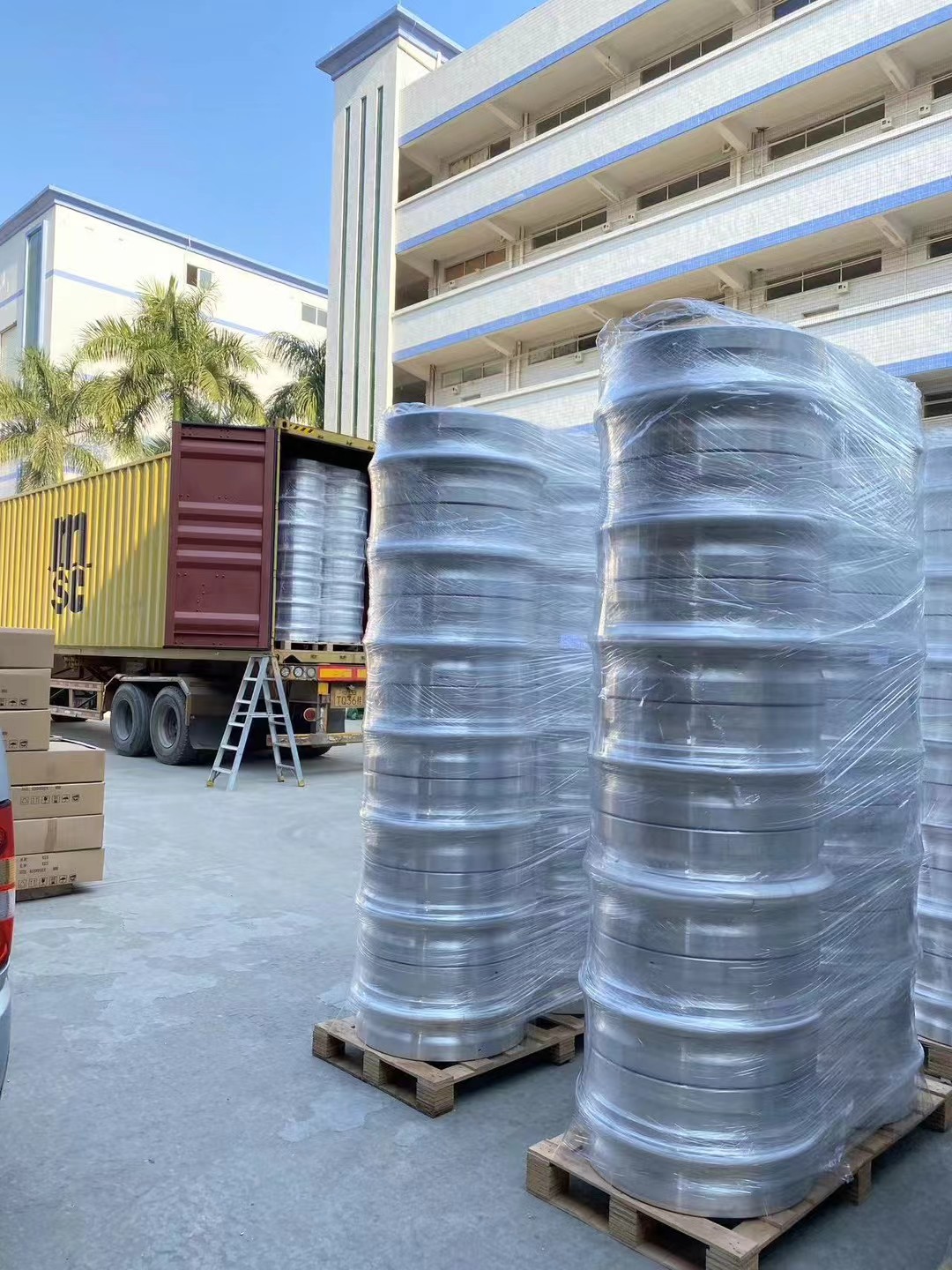 Container doors closed after protected wheel cargo is loaded
