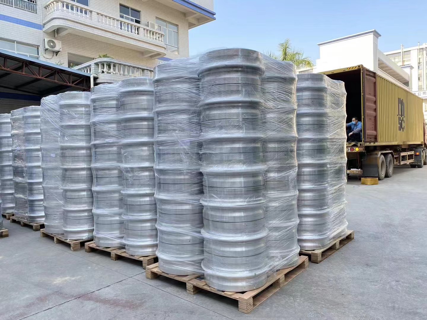 Alloy wheel cartons positioned inside an export container