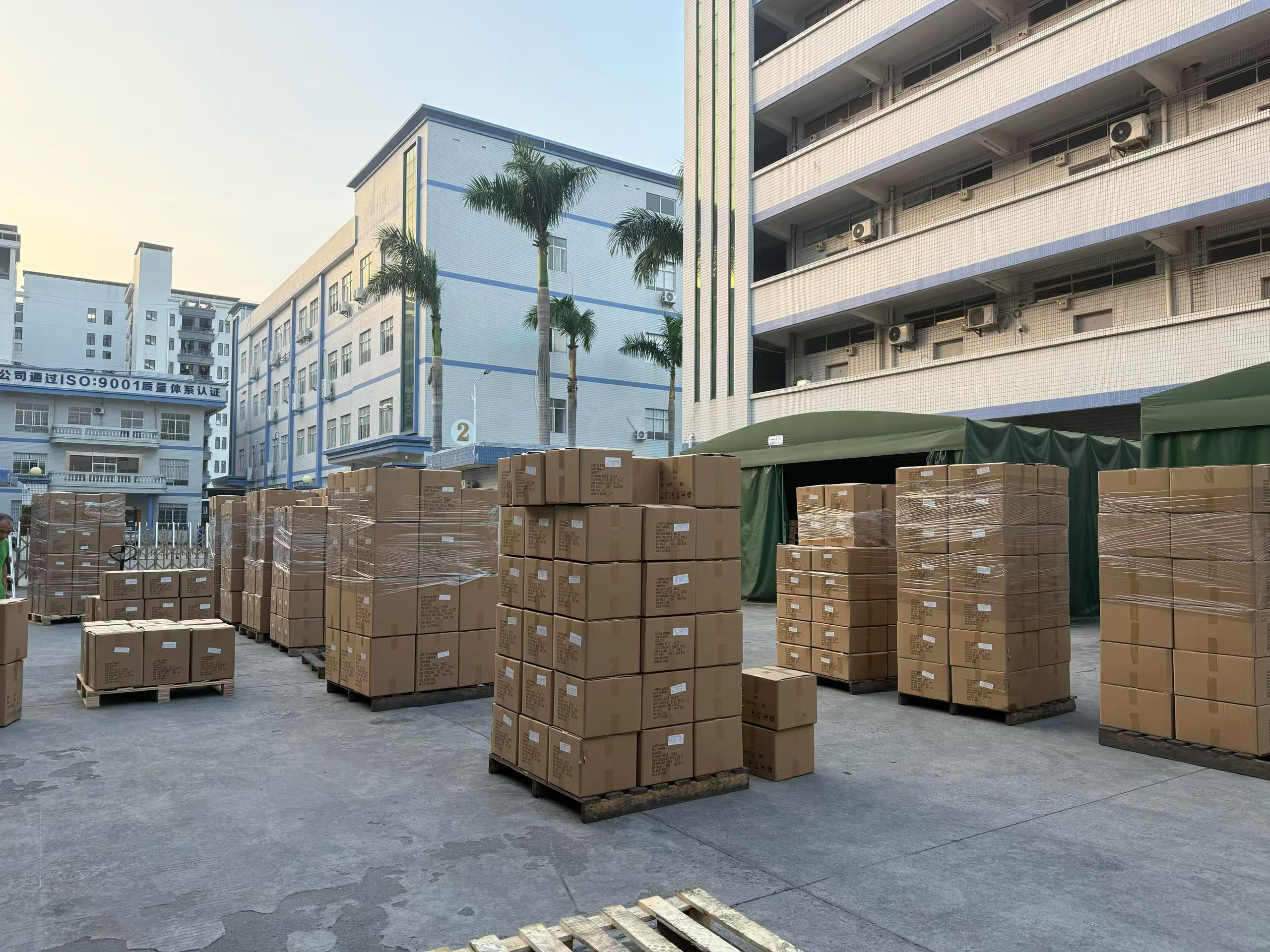 Stacked alloy wheel cartons prepared for export logistics